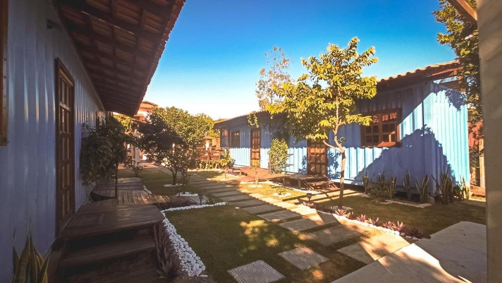 Área social da pousada Abrolhos Dive Inn, ponto de encontro para mergulhadores em Caravelas
